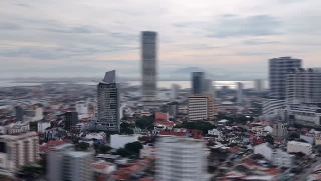 Aerial drone shot of the Penang city skyline including Komtar tower