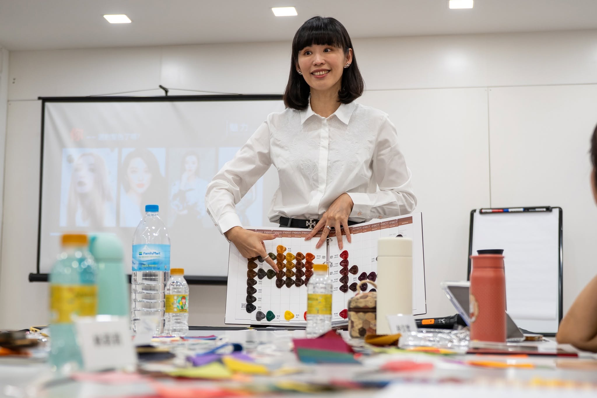 Presenter teaching a colour matching class